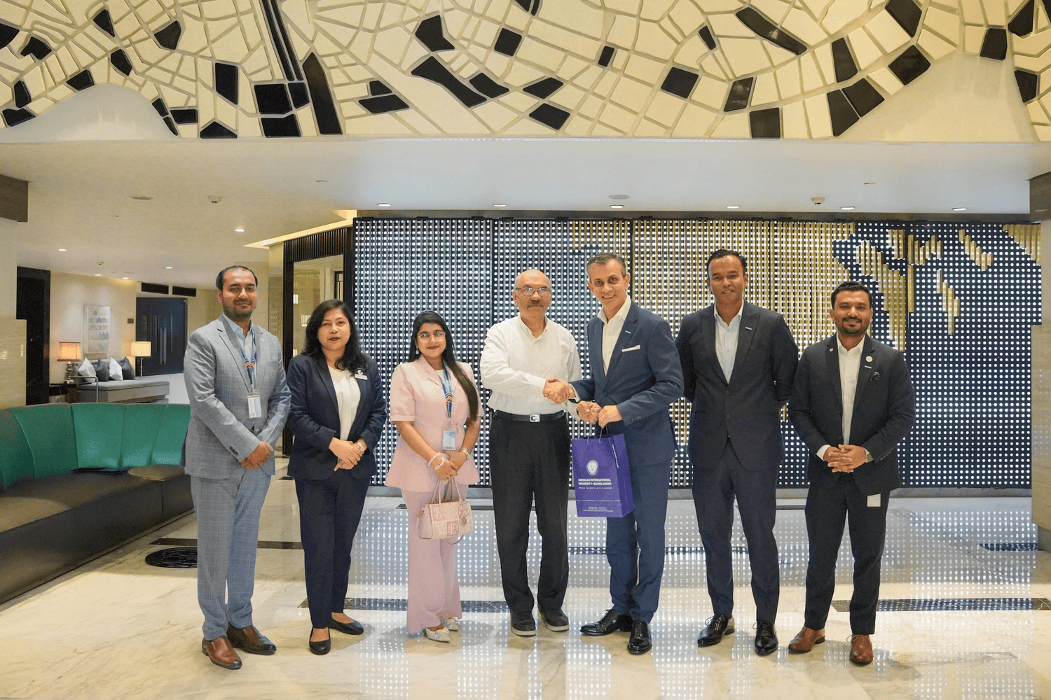 American International University-Bangladesh Signs MoU with Le Méridien Dhaka